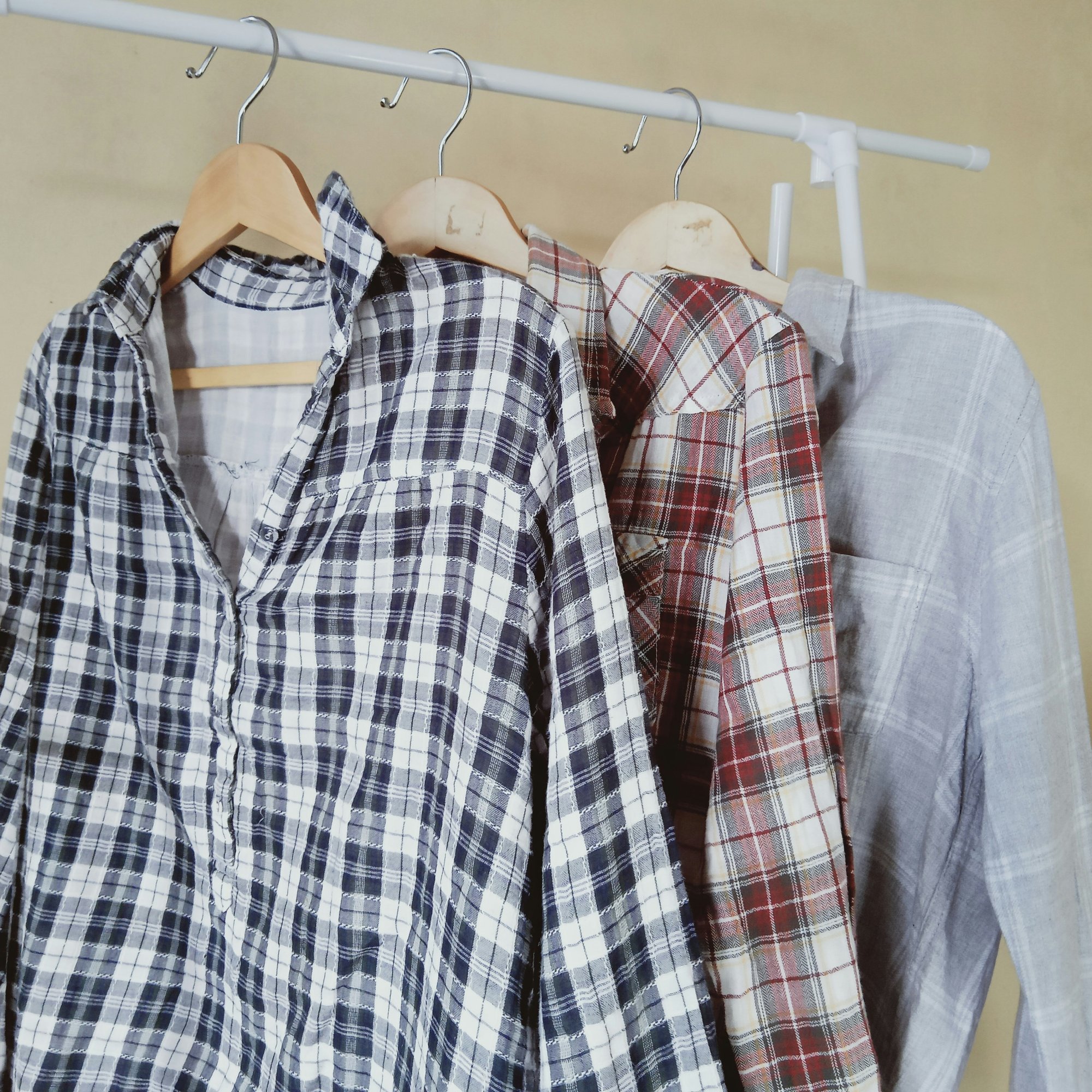 Woven shirts on rail